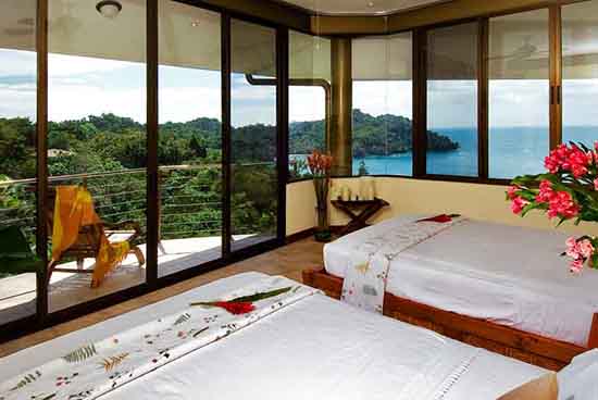 Bungalow surrounded by jungle with a view of the ocean